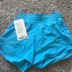 Women's Blue Lululemon high rise 4 inch shorts size 2 like new.